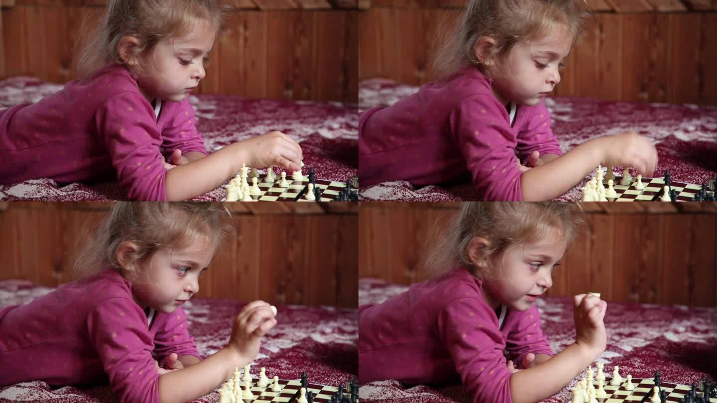 小女孩在床上下棋儿童下国际象棋陪伴玩耍童