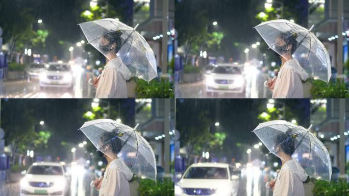 雨夜在路边打着伞等人的女孩视频素材