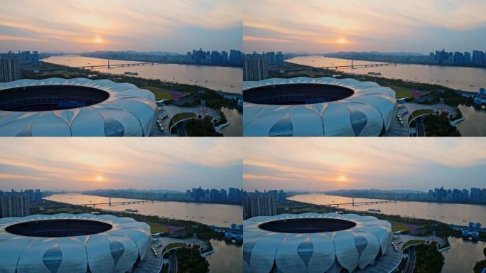航拍杭州夕阳下的奥体中心