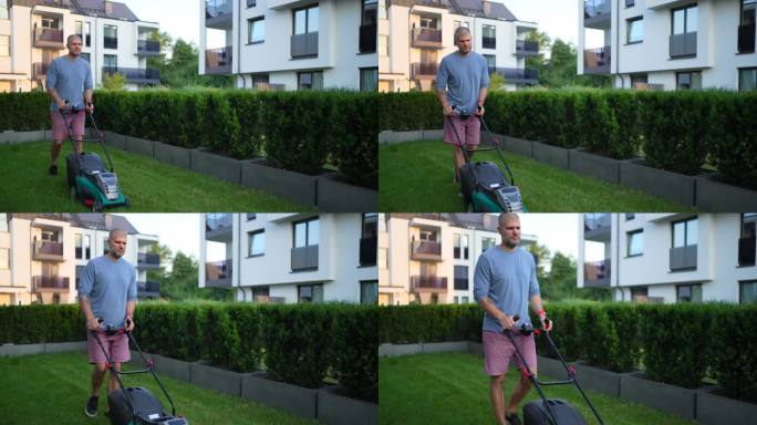 一名男子在后院使用割草机