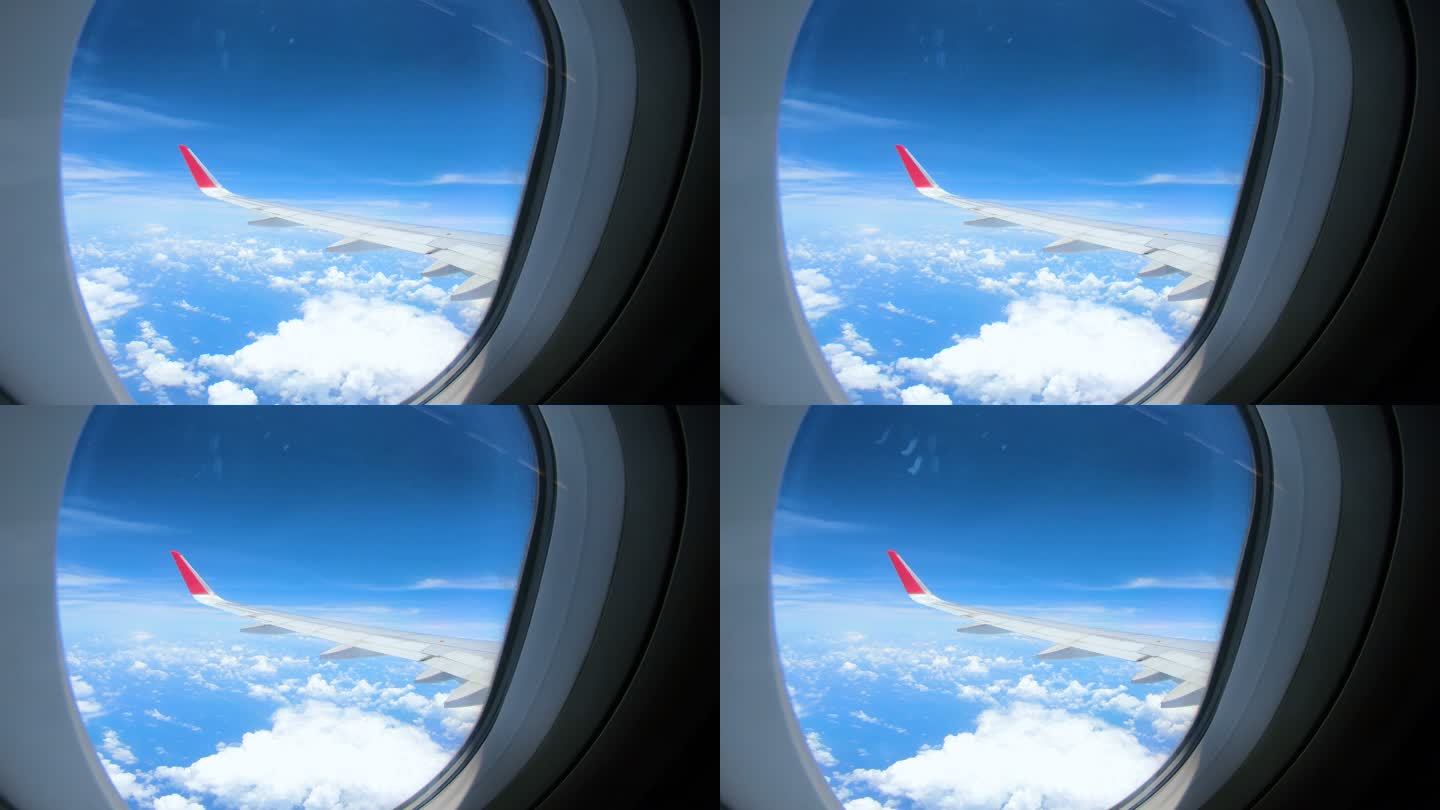 从飞机上观看云层出差搭机旅行航空业