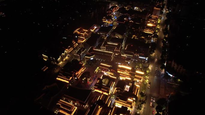 俯瞰仿古建筑商业步行街夜景亮化后飞摇城市