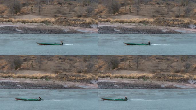 金沙江云南山区江河里的小船小舟升格慢镜头