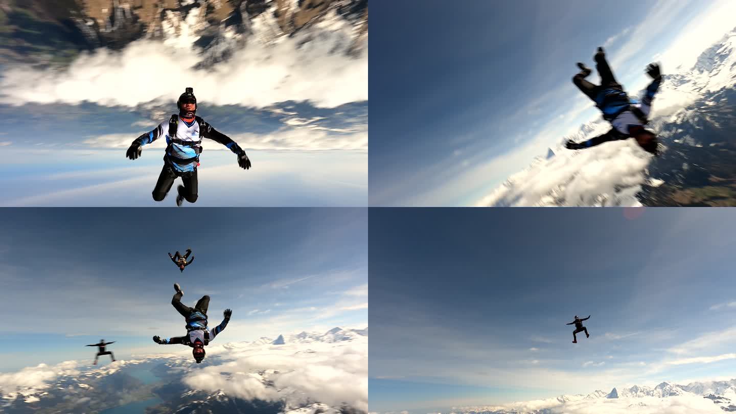 自由落体跳伞者在瑞士山区上空翱翔
