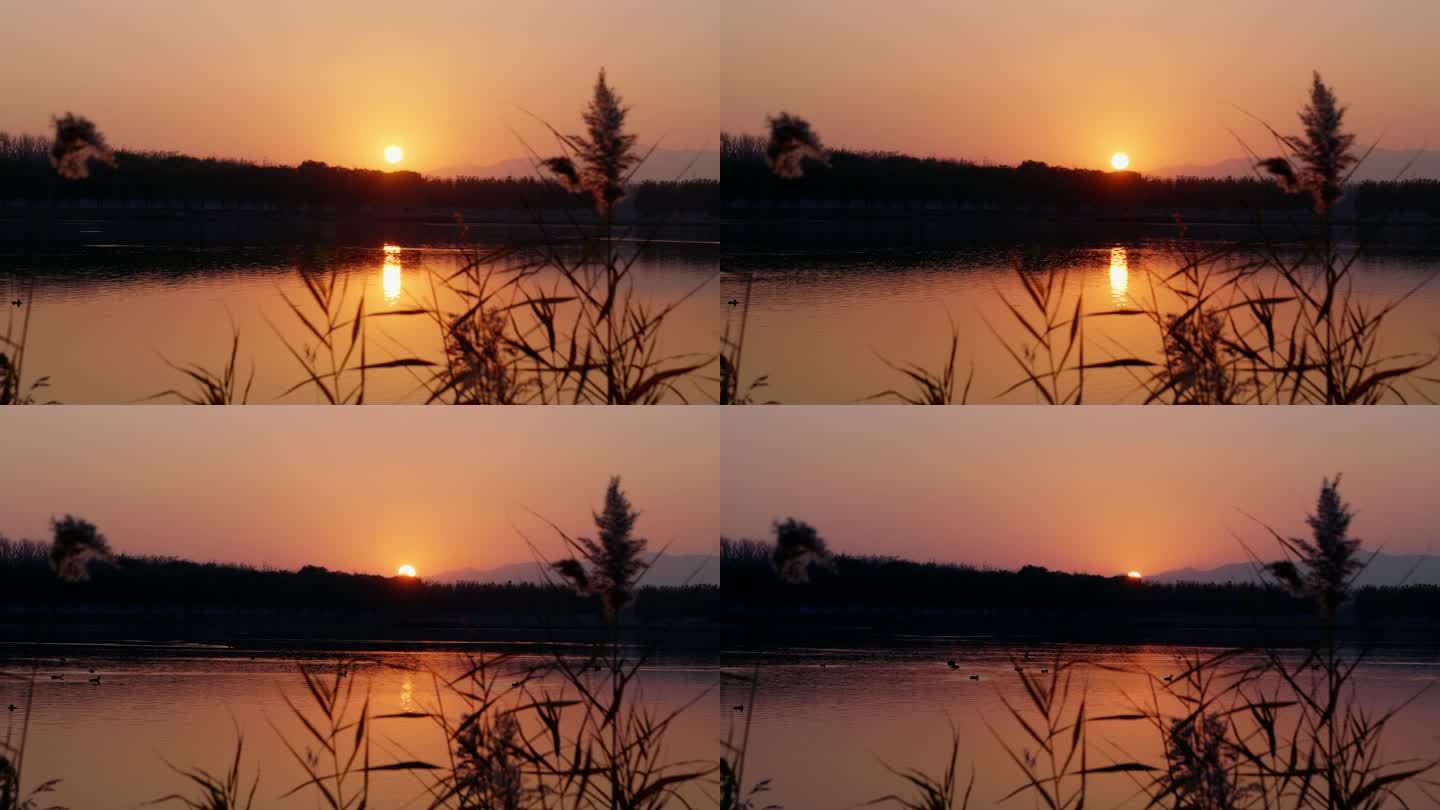 黄昏-湖面上的落日-延时摄影