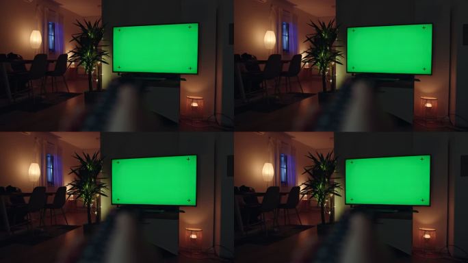 POV无法识别的人在带有色度键绿色屏幕的电视上冲浪