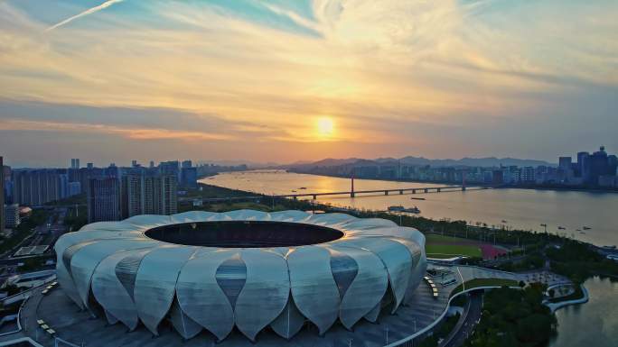 航拍夕阳下的杭州奥体中心