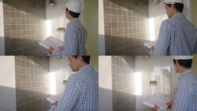亚洲男子工程师检查建筑厕所