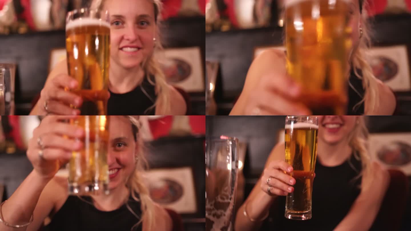 金发女人对着镜头举杯喝酒
