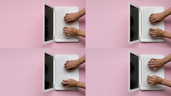 女性使用笔记本电脑键盘，通过关闭顶盖完成工作
