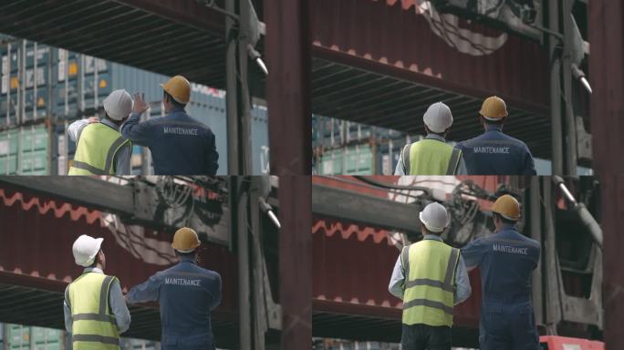后视图。工程师和工长穿着安全帽制服，通过对讲机交谈，控制叉车将货物提升到集装箱装卸场的集装箱卡车上，