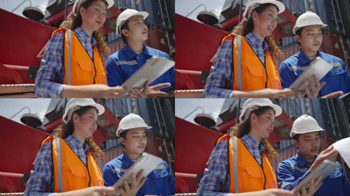 专业的物流业务团队。女经理与男工程师或主管讨论如何从货船上装载集装箱，以便在装卸场运输。