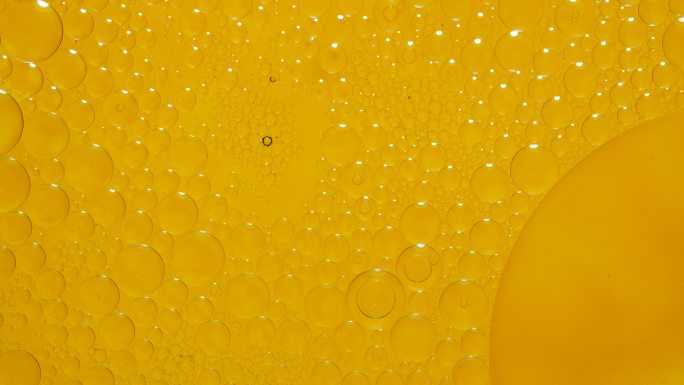 气泡液滴黄色背景抽象液体形状