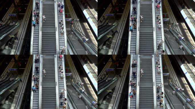 在楼梯和自动扶梯上旅行的人，德国柏林