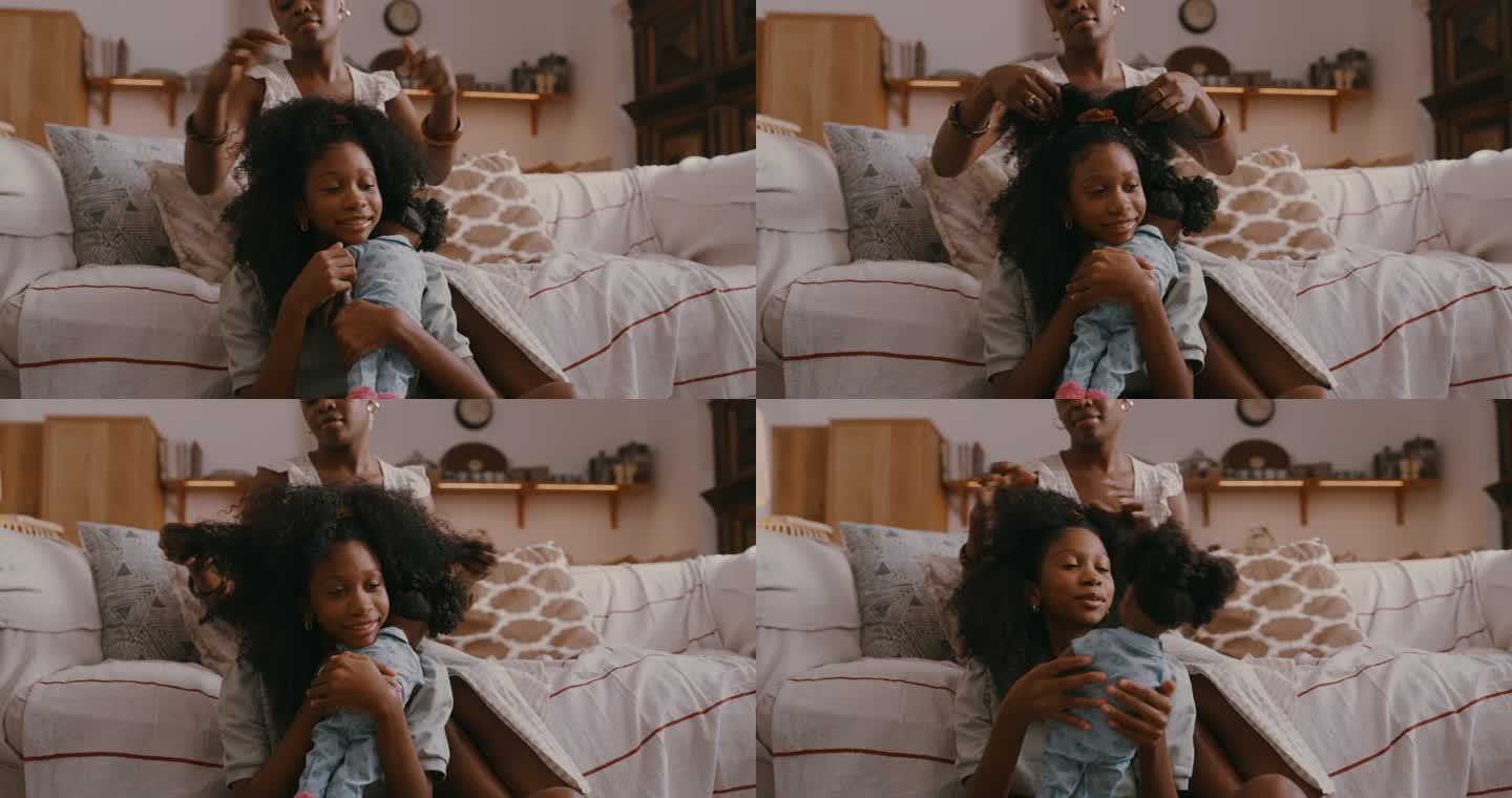 一位母亲在家给女儿刷头发的4k视频片段