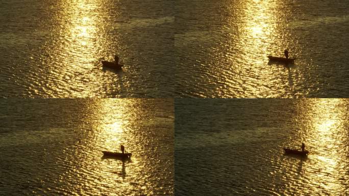 夕阳下渔民在湖面上撒网捕鱼8