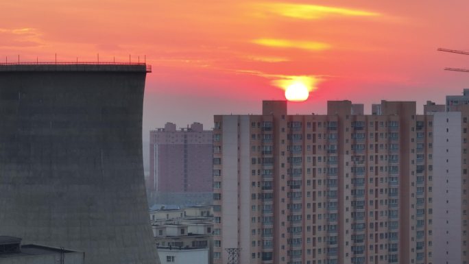 航拍新疆城市夕阳落日