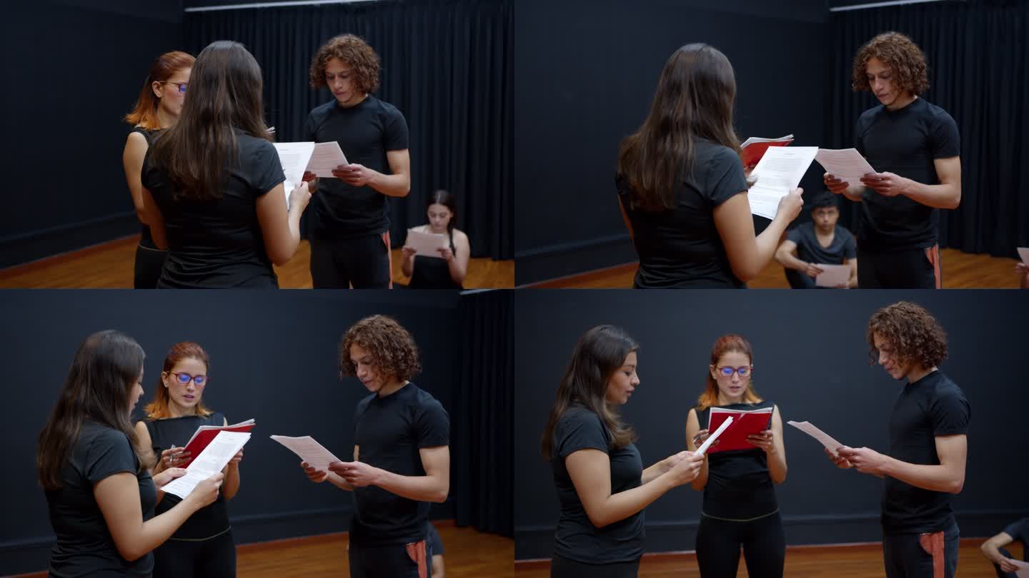 男主角和女演员在剧场排练时朗读剧本，女老师检查台词