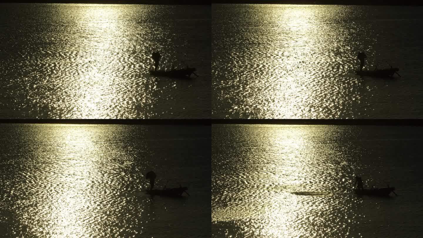夕阳下渔民在湖面上撒网捕鱼3