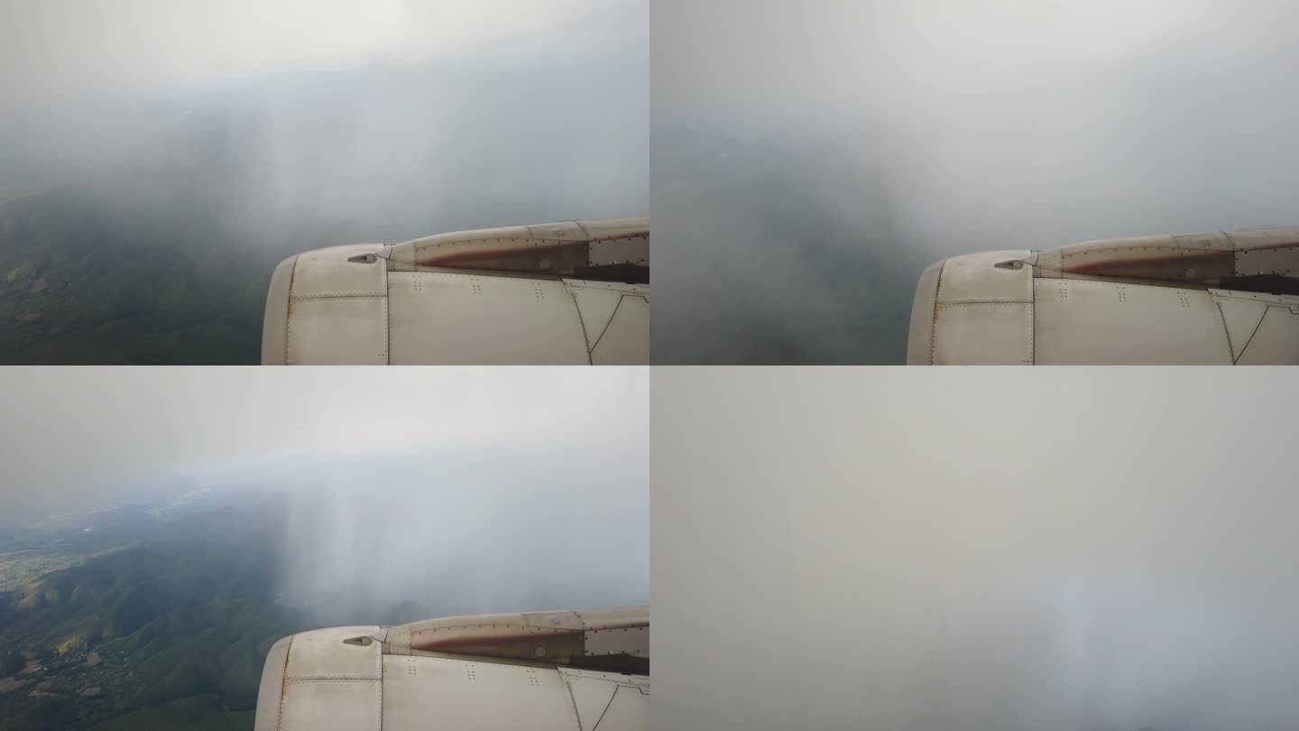 从飞机的窗户望去，天空乌云密布，雨点落下