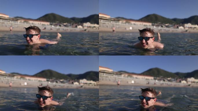 西西里小镇海滩上漂浮的十几岁男孩的肖像
