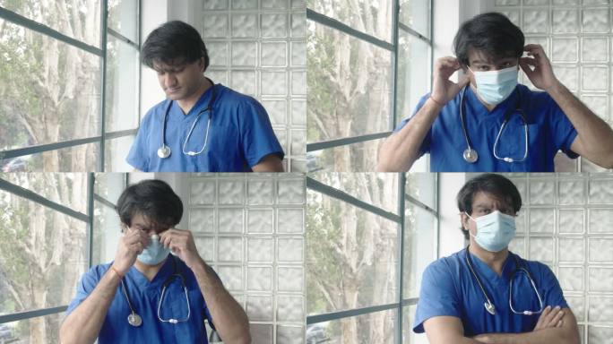 印度医生在医院调整防护面罩
