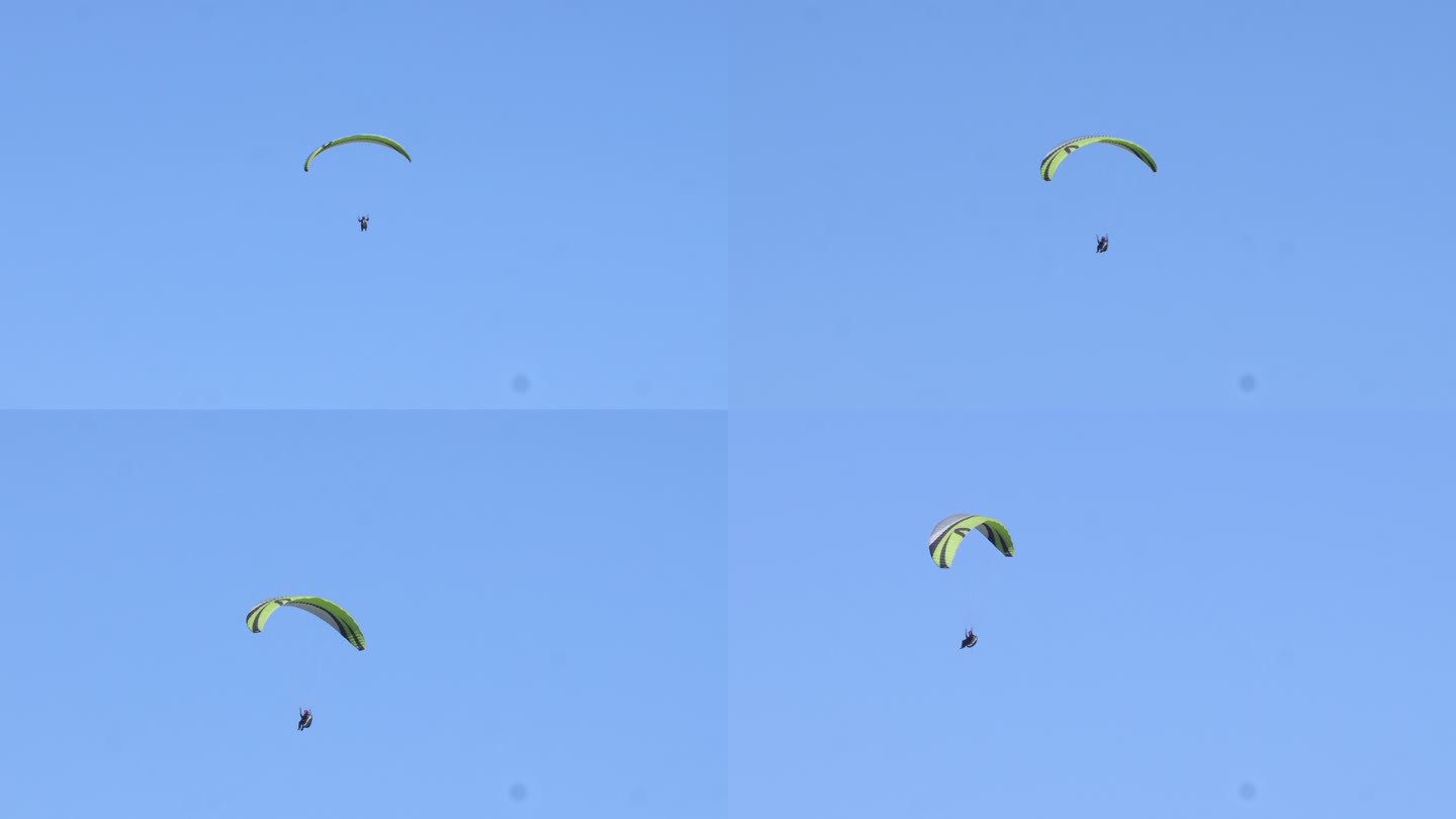 职业跳伞运动员在蓝天上飞行