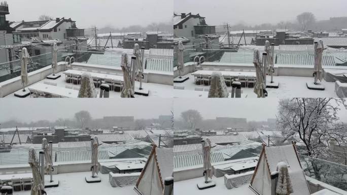 北京冬天下雪胡同四合院积雪房顶