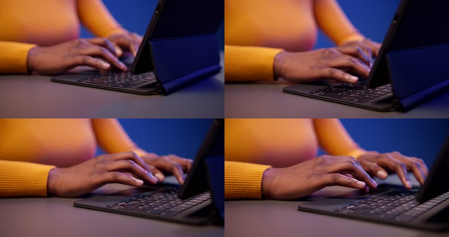 年轻的深色皮肤女子在笔记本电脑上打印