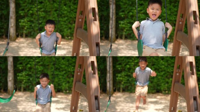 亚洲小孩在户外游乐场玩秋千、跷跷板和活动。户外学习、发现和快乐的概念