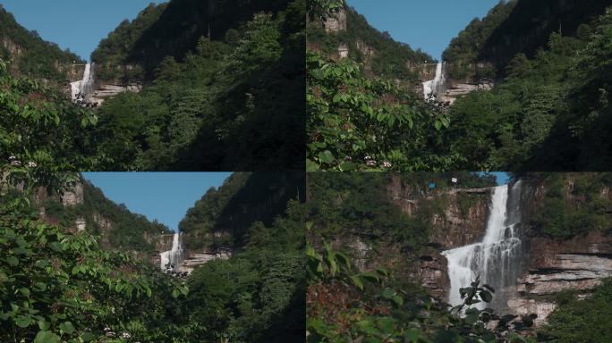 瀑布视频山林间绿色环抱大跌水远景