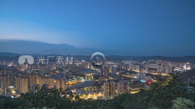 贵州毕节城市延时摄影日转夜天际线密度