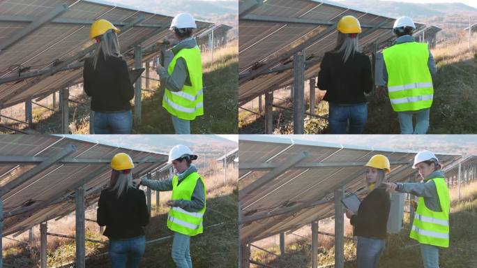 在太阳能发电厂工作的女工程师。团队合作可再生能源系统。太阳能城市。