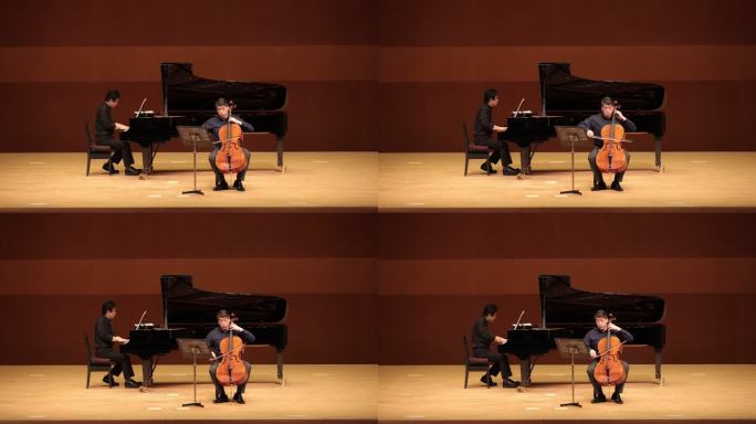 音乐家在古典音乐音乐会上演奏大提琴和钢琴