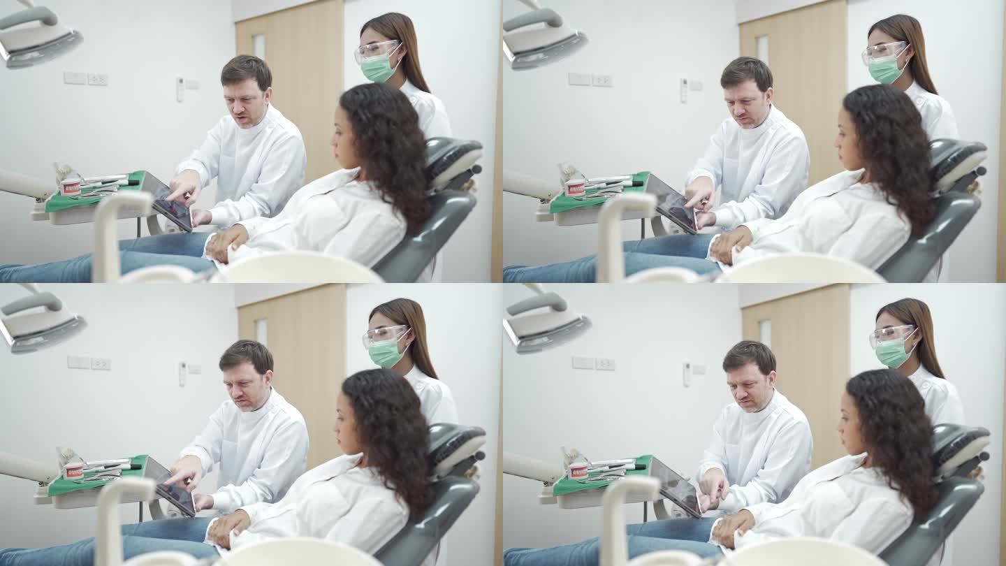 4K男牙医向患者解释牙齿X光