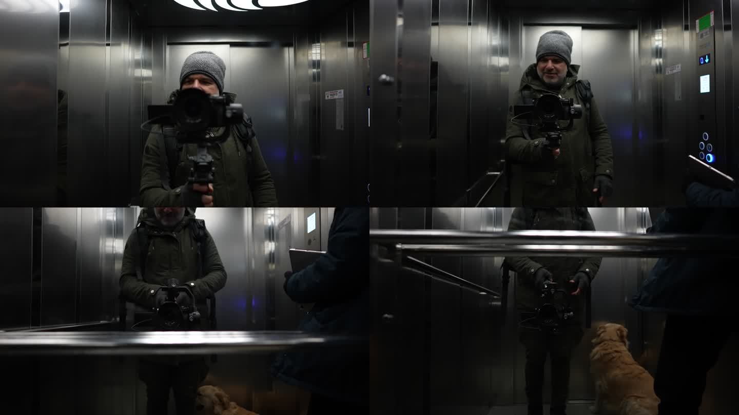 Vlogger男子在电梯中使用万向架相机，镜子自拍肖像