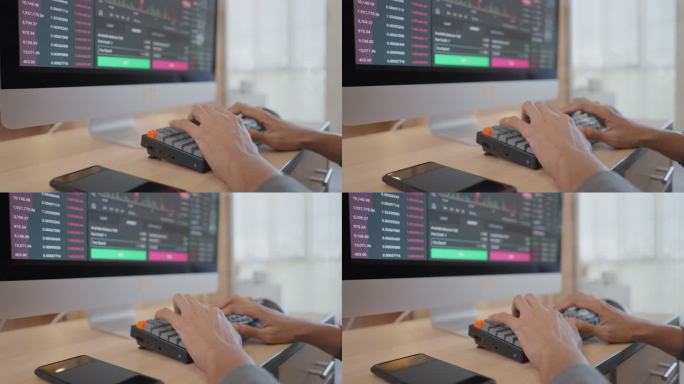 商业人士在办公室的笔记本电脑和台式电脑上监视股市金融指数分析的统计图。分析和交易股票概念。描绘交易视