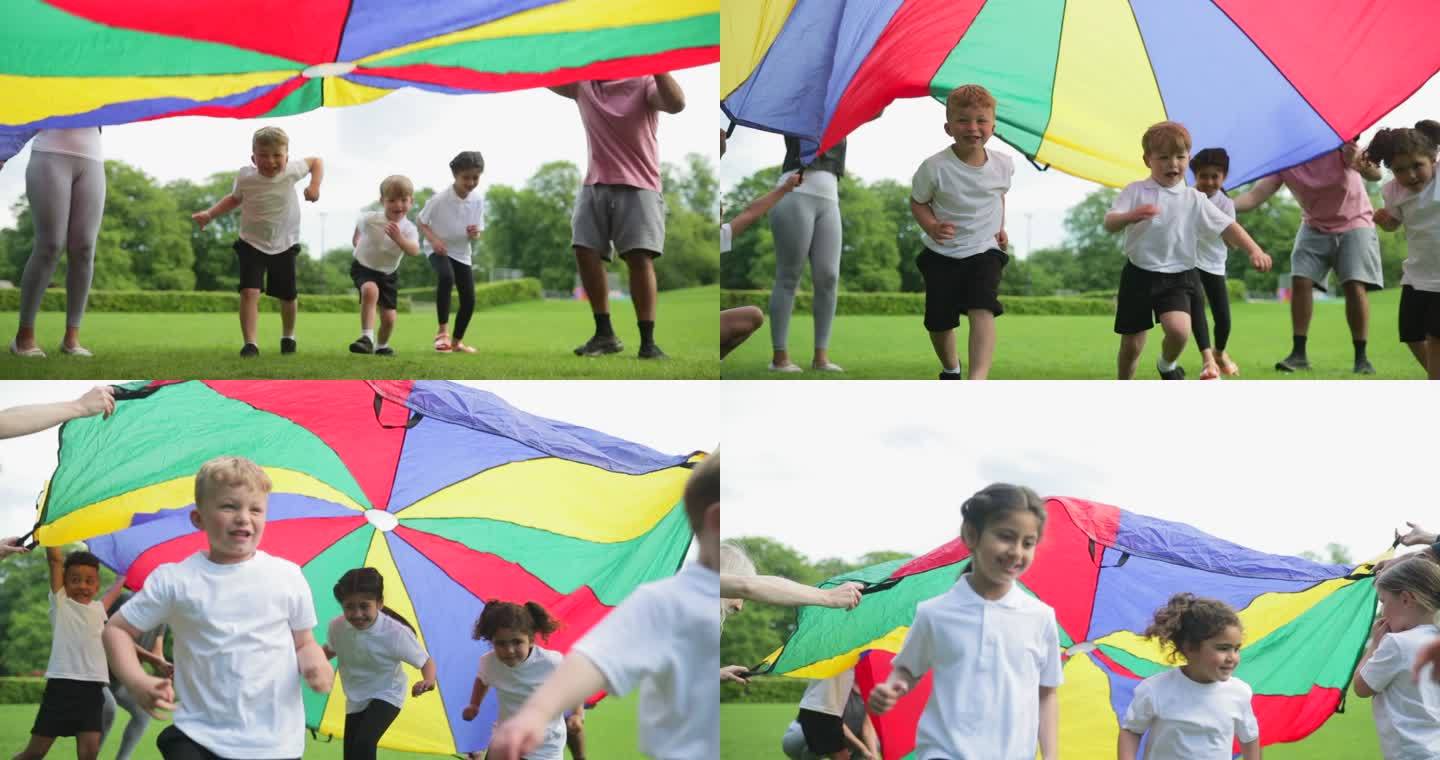 玩降落伞孩子小孩奔跑躲避参与感
