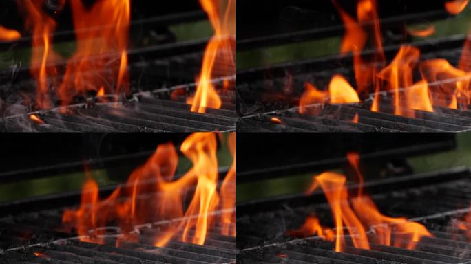 烤架上燃烧的火焰的慢镜头特写