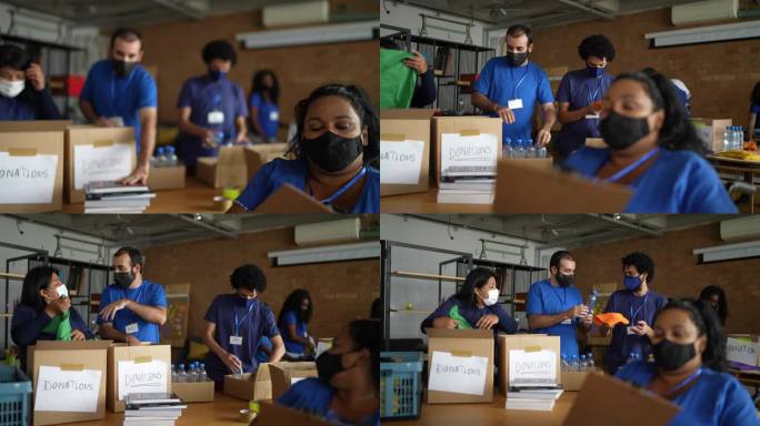 在社区慈善捐赠中心工作的志愿者-使用防护面罩-包括一名残疾人
