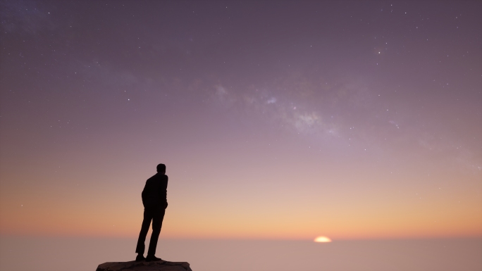 星空下高端商务男人站在山顶仰望银河日出
