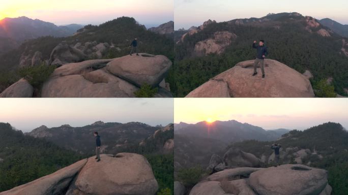 男子登山 站在山顶欢呼雀跃 成功胜利