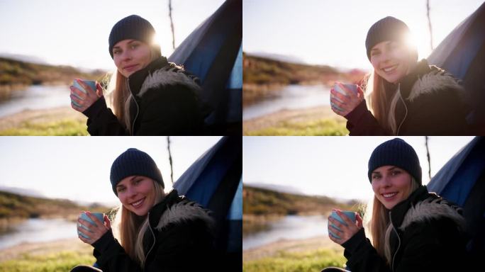 一位年轻女子在露营旅行中坐着喝咖啡的4k视频片段