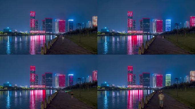 夏季夜晚义乌江边大量市民休闲观光延时摄影