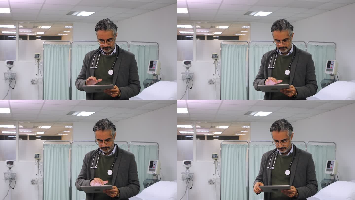 医生在数字平板电脑上查看患者病历