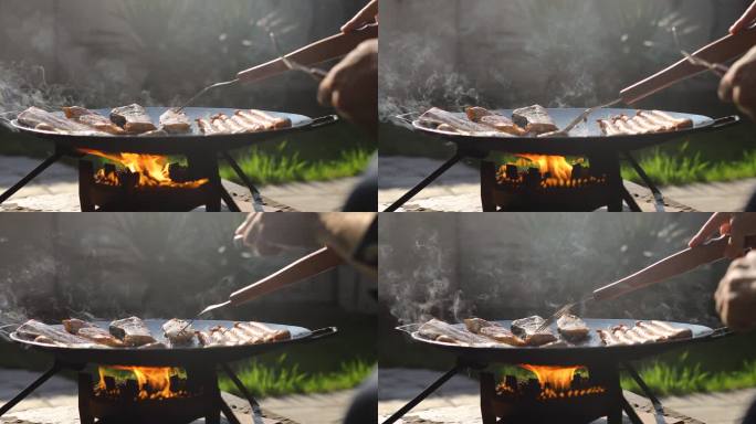 无法辨认的男子在热铁板上烤肉的特写镜头