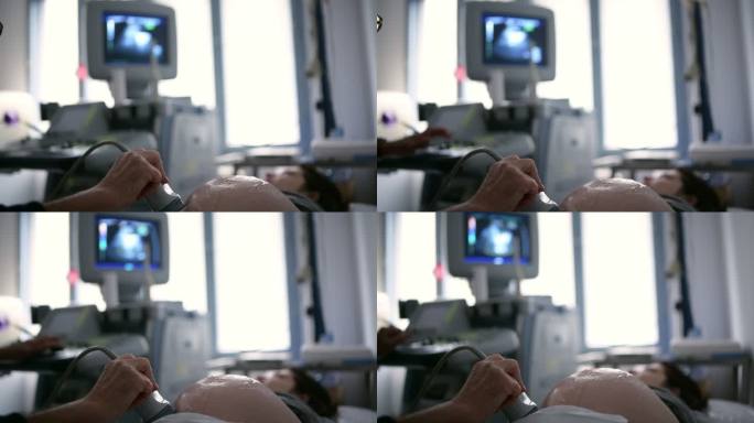 孕妇和医生检查超声波。