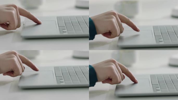 手指操作笔记本电脑特写