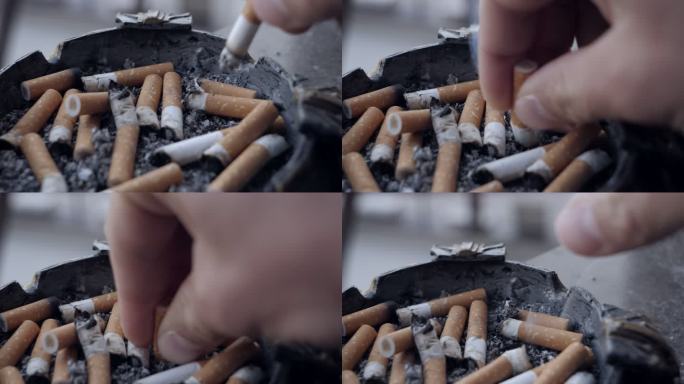 无名男子熄灭香烟健康问题不健康
