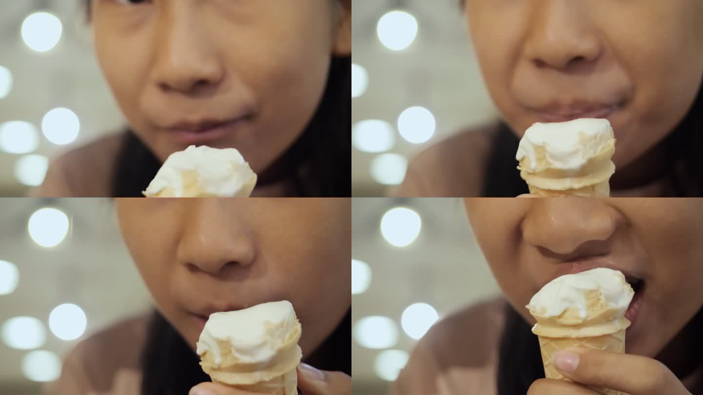 女孩舔香草冰淇淋筒与背景。